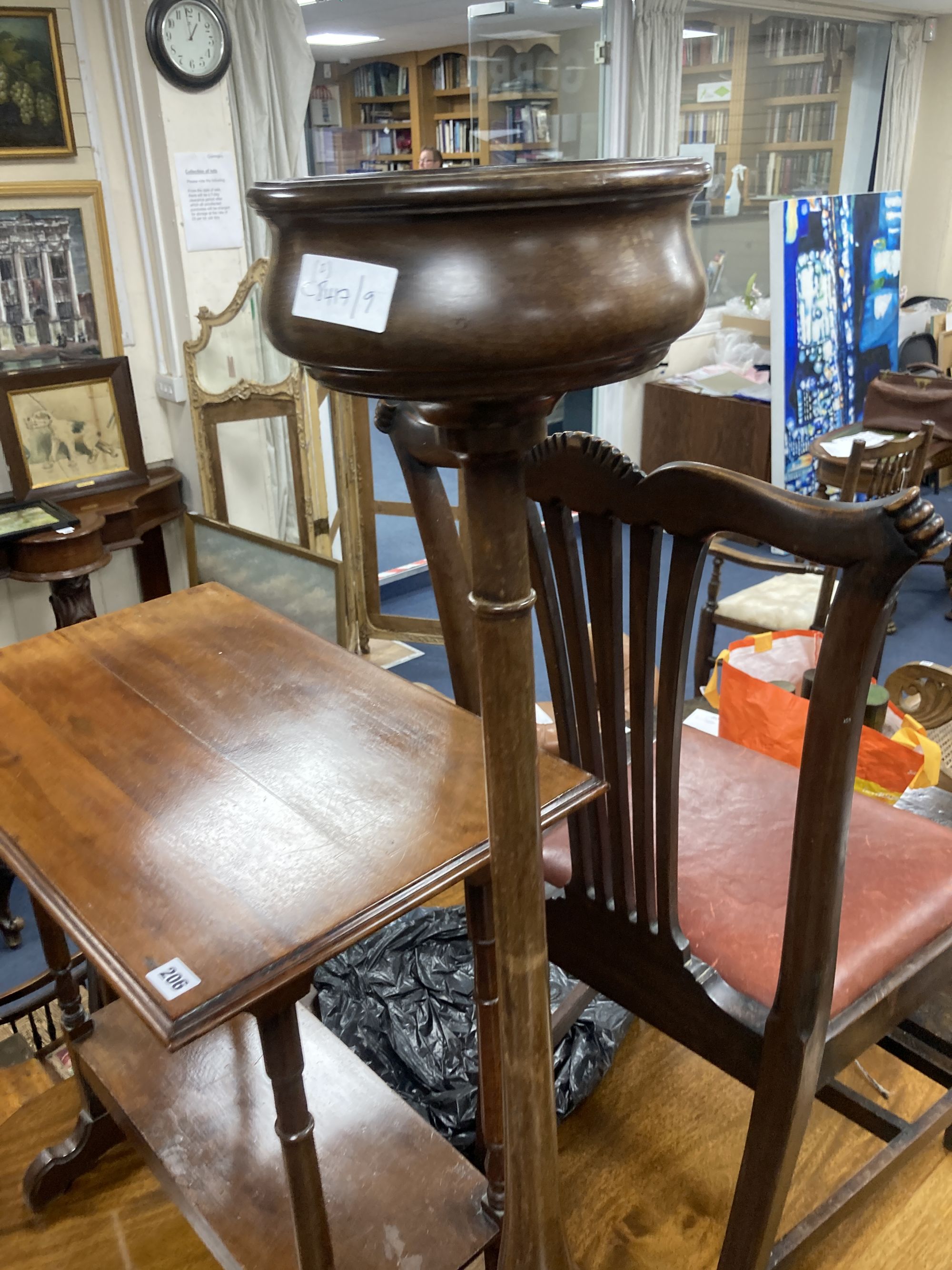 A 1920s mahogany tripod oil lamp standard, height 115cm and a two tier occasional table